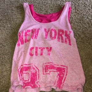 Tank top, comes with a mesh sorts bra.